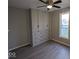 Bright bedroom with built-in storage and vinyl flooring at 213 E Broadway St, Alexandria, IN 46001