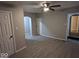 Living room with access to other rooms and a ceiling fan at 213 E Broadway St, Alexandria, IN 46001