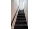 Staircase leading to the upper level of the home at 213 E Broadway St, Alexandria, IN 46001