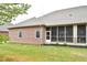 Brick home with screened porch and grassy yard at 2749 Stones Bay Dr, Greenwood, IN 46143