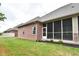 Brick home with screened porch and grassy yard at 2749 Stones Bay Dr, Greenwood, IN 46143