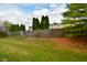 Backyard with wooden fence and landscaping at 2749 Stones Bay Dr, Greenwood, IN 46143