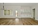 Spacious dining room, built-in buffet, hardwood floors, and backyard access at 2749 Stones Bay Dr, Greenwood, IN 46143