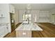Kitchen island with large granite countertop and sink at 2749 Stones Bay Dr, Greenwood, IN 46143