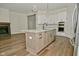 Modern kitchen with island, stainless steel appliances, and white cabinetry at 2749 Stones Bay Dr, Greenwood, IN 46143