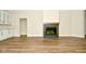 Fireplace with built-in cabinets and hardwood floors at 2749 Stones Bay Dr, Greenwood, IN 46143