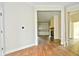 Open living area with hardwood floors and a fireplace at 2749 Stones Bay Dr, Greenwood, IN 46143