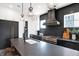 Gourmet kitchen with a statement range hood and a large farmhouse sink at 725 N Cleveland St, Indianapolis, IN 46202