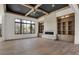Spacious living room with built-in shelving, fireplace, and high ceilings at 9280 Highpointe Ln, Zionsville, IN 46077