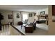 Spacious living room featuring a fireplace and ample natural light at 4501 N Wheeling Ave # 3-106, Muncie, IN 47304