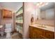 Clean bathroom with wood cabinets and a shower/tub combo at 4501 N Wheeling Ave # 3-106, Muncie, IN 47304