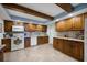 Kitchen boasts oak cabinets, granite countertops, and tile flooring at 4501 N Wheeling Ave # 3-106, Muncie, IN 47304