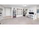 Bright and airy entryway with tile flooring and built-in shelving at 8751 Jaffa Court E Dr # 35, Indianapolis, IN 46260