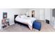 Spacious bedroom with a comfortable bed and en-suite bathroom access at 8751 Jaffa Court E Dr # 35, Indianapolis, IN 46260