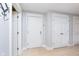 Simple condo entryway with white door and closet at 8751 Jaffa Court E Dr # 35, Indianapolis, IN 46260