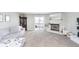 Relaxing living room with a cozy fireplace and sliding glass doors to balcony at 8751 Jaffa Court E Dr # 35, Indianapolis, IN 46260