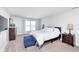 Bright bedroom with a comfortable bed and plenty of closet space at 8751 Jaffa Court E Dr # 35, Indianapolis, IN 46260