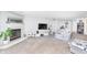 Living room boasts a fireplace, large TV, and comfortable seating at 8751 Jaffa Court E Dr # 35, Indianapolis, IN 46260