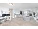 Spacious living room featuring a fireplace, comfortable seating, and a dedicated workspace at 8751 Jaffa Court E Dr # 35, Indianapolis, IN 46260