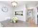 Bright dining room with view into kitchen and hallway at 8751 Jaffa Court E Dr # 35, Indianapolis, IN 46260
