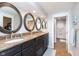 Elegant bathroom with double vanity and large mirrors at 8751 Jaffa Court E Dr # 35, Indianapolis, IN 46260