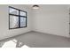 Bright bedroom with carpet flooring and large window at 679 E 16Th St, Indianapolis, IN 46202
