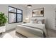 Spacious bedroom with a large bed, window, and neutral decor at 679 E 16Th St, Indianapolis, IN 46202
