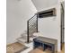 Stylish staircase with built-in bench and storage at 679 E 16Th St, Indianapolis, IN 46202