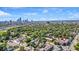 Aerial view highlighting the property's location in a city neighborhood near the downtown skyline at 679 E 16Th St, Indianapolis, IN 46202