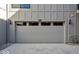 Attached garage with three-window design at 679 E 16Th St, Indianapolis, IN 46202