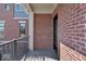 Private balcony with brick wall and wood deck at 679 E 16Th St, Indianapolis, IN 46202