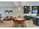 Open concept dining area with a live edge table and leather chairs at 721 E 16Th St, Indianapolis, IN 46202