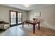 Bright home office with hardwood floors and patio access at 721 E 16Th St, Indianapolis, IN 46202