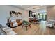 Open concept living room showcasing stylish furniture and a view into the kitchen at 721 E 16Th St, Indianapolis, IN 46202