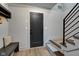 Light and bright entryway with built-in bench seating at 721 E 16Th St, Indianapolis, IN 46202