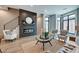 Living room with fireplace, hardwood floors, and stylish seating at 721 E 16Th St, Indianapolis, IN 46202