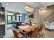 Open dining area with a live edge table and leather chairs at 721 E 16Th St, Indianapolis, IN 46202