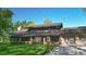 Ranch home with a large yard and attached garage at 8494 W Mulligan Ln, Columbus, IN 47201
