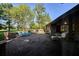 Large brick patio with fountain and lounge chairs at 8494 W Mulligan Ln, Columbus, IN 47201
