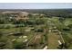Aerial view of a lush golf course community at 8494 W Mulligan Ln, Columbus, IN 47201