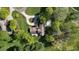 House with pool, situated on a tree-lined property at 8494 W Mulligan Ln, Columbus, IN 47201