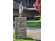 Brick entrance pillar with house number and elegant lamp post at 8494 W Mulligan Ln, Columbus, IN 47201