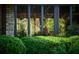 Landscaped greenery frames a large window at 8494 W Mulligan Ln, Columbus, IN 47201
