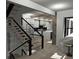 Modern staircase with metal railing and wood steps at 723 N Cleveland St, Indianapolis, IN 46202