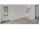 Unfurnished room with door and window at 723 N Cleveland St, Indianapolis, IN 46202