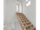 Unfinished wooden staircase in new home at 723 N Cleveland St, Indianapolis, IN 46202