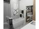 Spa-like bathroom with soaking tub and walk-in shower at 723 N Cleveland St, Indianapolis, IN 46202