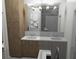 Modern bathroom with double vanity and large mirror at 723 N Cleveland St, Indianapolis, IN 46202