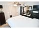 Spacious bedroom with ample closet space and a large dresser at 1431 E Pleasant Run Parkway South Dr, Indianapolis, IN 46203