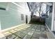 Charming backyard patio with a modern square tile design and a grassy area at 2133 N Talbott St, Indianapolis, IN 46202